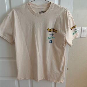 Pokémon Graphic Tee in Light Cream with Logo Oversized XS Unisex